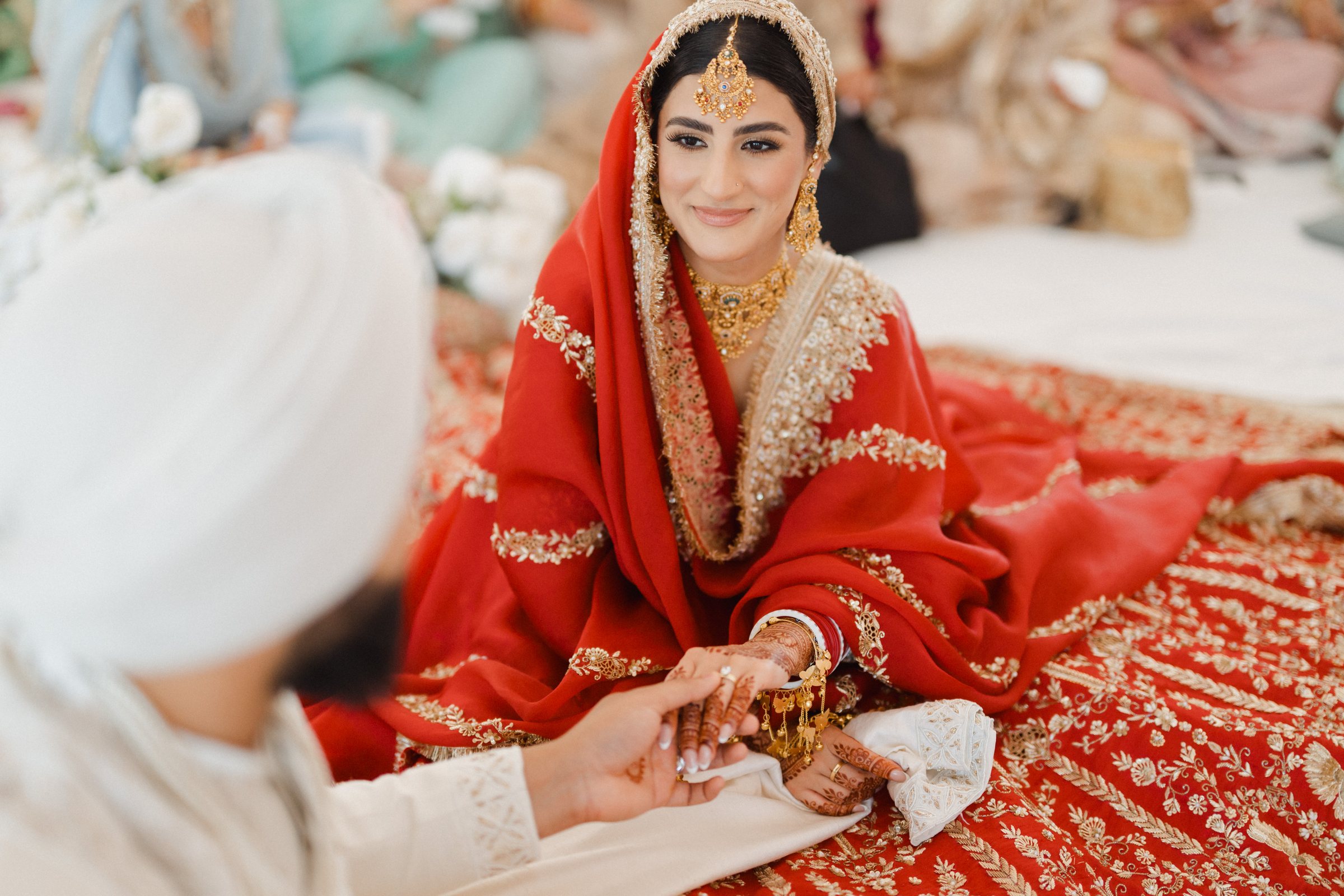 A bride smiling during the ceremony